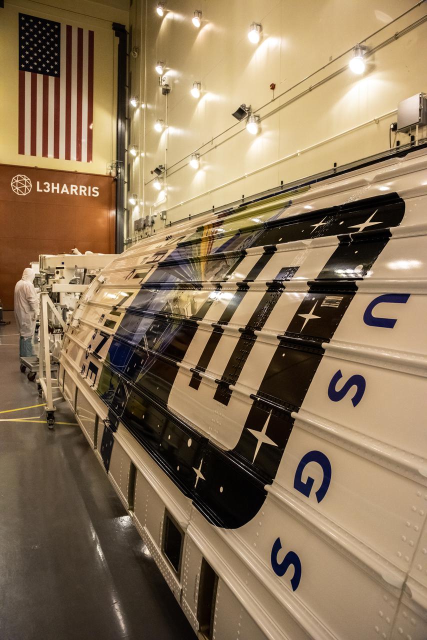 Preparations are underway to lift the first half of the United Launch Alliance Atlas V rocket payload fairing for NASA’s Landsat 9 satellite to the vertical position inside the Integrated Processing Facility at Vandenberg Space Force Base in California, on June 18, 2021. The fairings will encapsulate the satellite for its launch atop the Atlas V from Vandenberg in September 2021. The launch is being managed by NASA’s Launch Services Program based at Kennedy Space Center in Florida. Landsat 9 will continue the nearly 50-year legacy of previous Landsat missions. It will monitor key natural and economic resources from orbit. Landsat 9 is managed by the agency’s Goddard Space Flight Center in Greenbelt, Maryland. It will carry two instruments: the Operational Land Imager 2, which collects images of Earth’s landscapes in visible, near-infrared and shortwave infrared light, and the Thermal Infrared Sensor 2, which measures the temperature of land surfaces. Like its predecessors, Landsat 9 is a joint mission between NASA and the U.S. Geological Survey. 