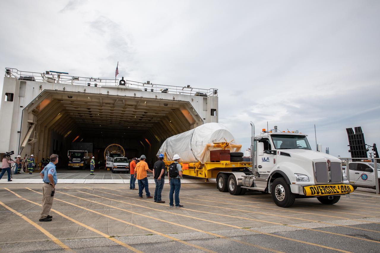 The United Launch Alliance (ULA) Atlas V booster and Centaur upper stage for Boeing's CST-100 Starliner Crew Flight Test (CFT) are unloaded from a rocket-delivery ship at Cape Canaveral Space Force Station on June 21, 2021. Starliner's first flight with astronauts aboard, CFT will launch from Space Launch Complex 41 at Cape Canaveral Space Force Station in Florida. The flight test will demonstrate the ability of the Atlas V and Starliner to safely carry astronauts to and from the International Space Station for the agency's Commercial Crew Program.