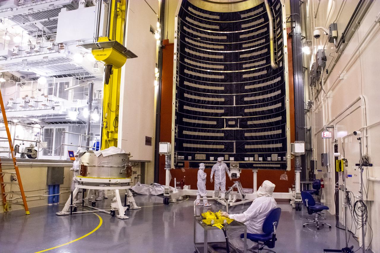 Inside the Integrated Processing Facility at Vandenberg Space Force Base in California, United Launch Alliance (ULA) technicians prepare to align the two ULA Atlas V rocket payload fairings for NASA’s Landsat 9 satellite on June 22, 2021. The fairings will encapsulate the satellite for its launch atop the Atlas V from Vandenberg in September 2021. The launch is being managed by NASA’s Launch Services Program based at Kennedy Space Center in Florida. Landsat 9 will continue the nearly 50-year legacy of previous Landsat missions. It will monitor key natural and economic resources from orbit. Landsat 9 is managed by the agency’s Goddard Space Flight Center in Greenbelt, Maryland. It will carry two instruments: the Operational Land Imager 2, which collects images of Earth’s landscapes in visible, near-infrared and shortwave infrared light, and the Thermal Infrared Sensor 2, which measures the temperature of land surfaces. Like its predecessors, Landsat 9 is a joint mission between NASA and the U.S. Geological Survey. 