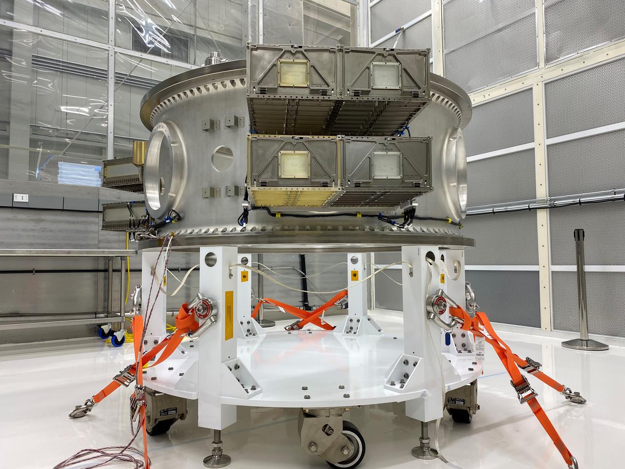 Mechanical and electrical support equipment for NASA’s Landsat 9 observatory are being processed inside the Integrated Processing Facility at Vandenberg Space Force Base in California, on June 24, 2021. The equipment includes a secondary payload adapter and flight system for a group of microsat payloads, called CubeSats, that will launch with Landsat 9 as secondary payloads. Landsat 9 will launch on a United Launch Alliance Atlas V rocket from Space Launch Complex 3 at Vandenberg in September 2021. The launch is being managed by NASA’s Launch Services Program based at Kennedy Space Center, America’s multiuser spaceport. The Landsat 9 satellite will continue the nearly 50-year legacy of previous Landsat missions. It will monitor key natural and economic resources from orbit. Landsat 9 is managed by the agency’s Goddard Space Flight Center in Greenbelt, Maryland. The satellite will carry two instruments: the Operational Land Imager 2, which collects images of Earth’s landscapes in visible, near infrared and shortwave infrared light, and the Thermal Infrared Sensor 2, which measures the temperature of land surfaces. Like its predecessors, Landsat 9 is a joint mission between NASA and the U.S. Geological Survey.