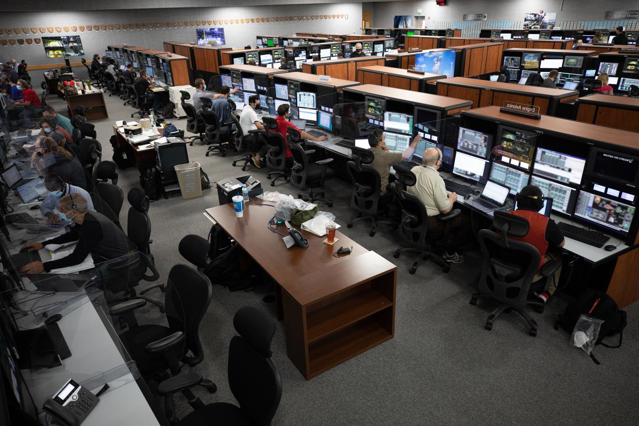 Members of the Artemis I launch team, including personnel with NASA’s Exploration Ground Systems (EGS) and contractor Jacobs, monitor activities during the ninth formal terminal countdown simulation inside Firing Room 1 in the Launch Control Center at NASA’s Kennedy Space Center in Florida on June 24, 2021. This is part of a series of simulations to help the team prepare for the launch of Artemis I, the uncrewed first flight of the Space Launch System rocket and Orion spacecraft.
