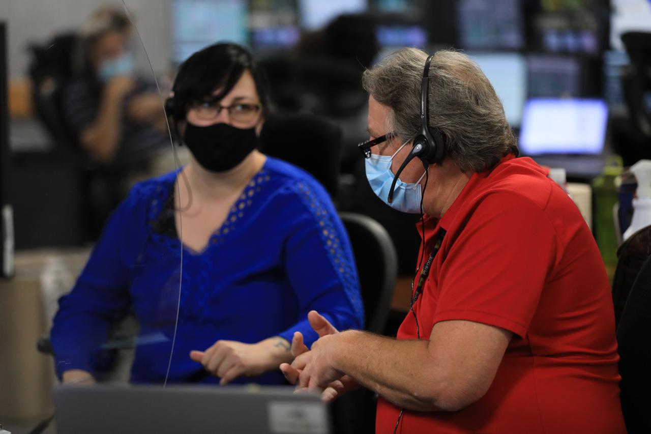 Members of the Artemis I launch team, including personnel with NASA’s Exploration Ground Systems (EGS) and contractor Jacobs, monitor activities during the ninth formal terminal countdown simulation inside Firing Room 1 in the Launch Control Center at NASA’s Kennedy Space Center in Florida on June 24, 2021. This is part of a series of simulations to help the team prepare for the launch of Artemis I, the uncrewed first flight of the Space Launch System rocket and Orion spacecraft. 