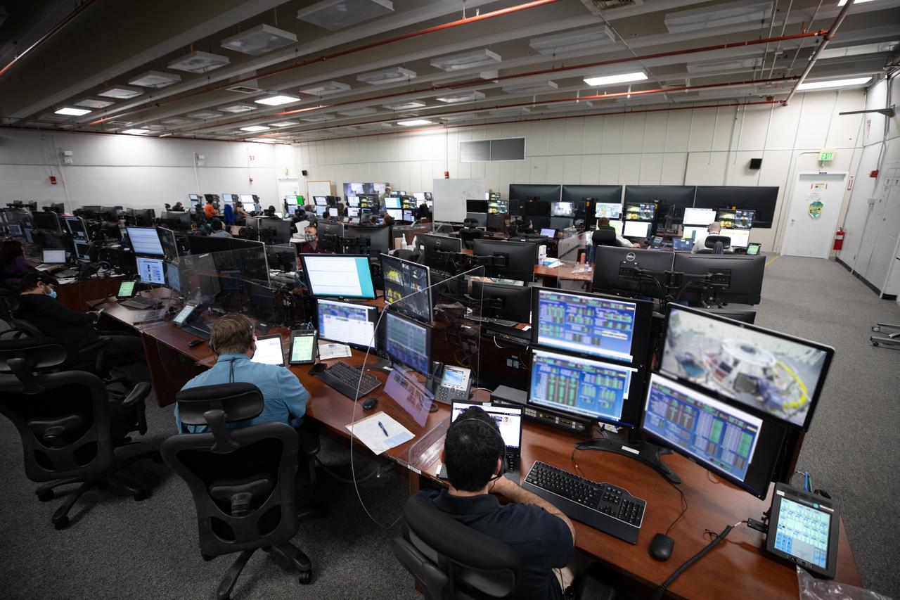 Members of the Artemis I launch team, including personnel with NASA’s Exploration Ground Systems (EGS) and contractor Jacobs, monitor activities during the ninth formal terminal countdown simulation inside Firing Room 2 in the Launch Control Center at NASA’s Kennedy Space Center in Florida on June 24, 2021. This is part of a series of simulations to help the team prepare for the launch of Artemis I, the uncrewed first flight of the Space Launch System rocket and Orion spacecraft. 