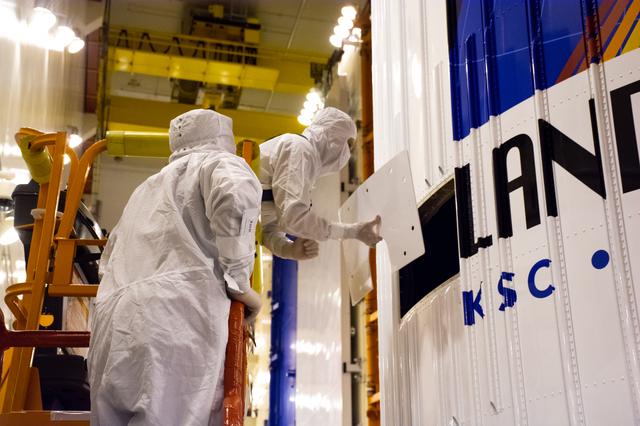 NASA image: Landsat 9 Fairing Contamination Barrier and Access Door Removal