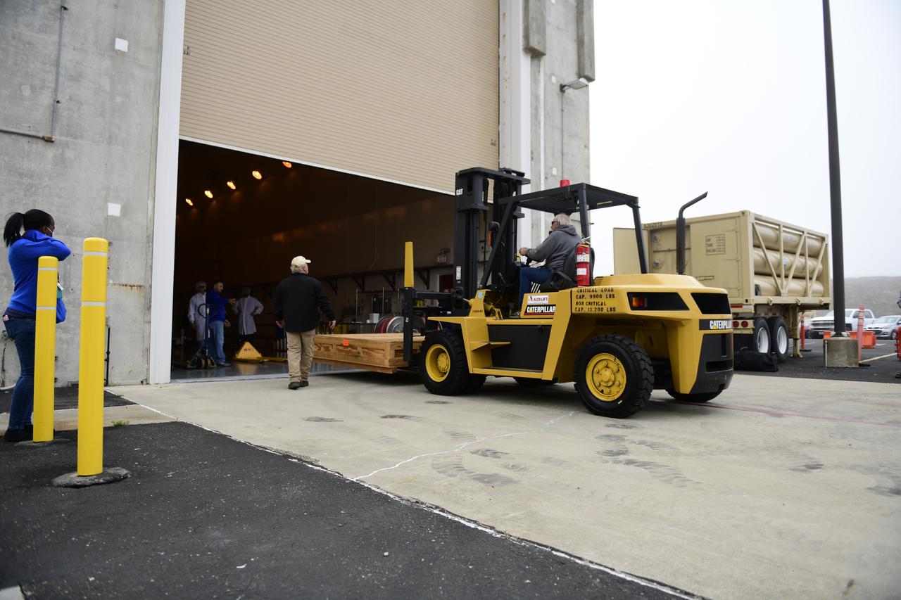 Containers of electrical ground support equipment for NASA’s Landsat 9 mission are moved inside the Integrated Processing Facility at Vandenberg Space Force Base in California, on June 29, 2021. The Landsat 9 mission will launch atop a United Launch Alliance Atlas V rocket from Vandenberg in September 2021. The launch is being managed by NASA’s Launch Services Program based at Kennedy Space Center. The Landsat 9 satellite will continue the nearly 50-year legacy of previous Landsat missions. It will monitor key natural and economic resources from orbit. Landsat 9 is managed by the agency’s Goddard Space Flight Center in Greenbelt, Maryland. The satellite will carry two instruments: the Operational Land Imager 2, which collects images of Earth’s landscapes in visible, near infrared and shortwave infrared light, and the Thermal Infrared Sensor 2, which measures the temperature of land surfaces. Like its predecessors, Landsat 9 is a joint mission between NASA and the U.S. Geological Survey. 