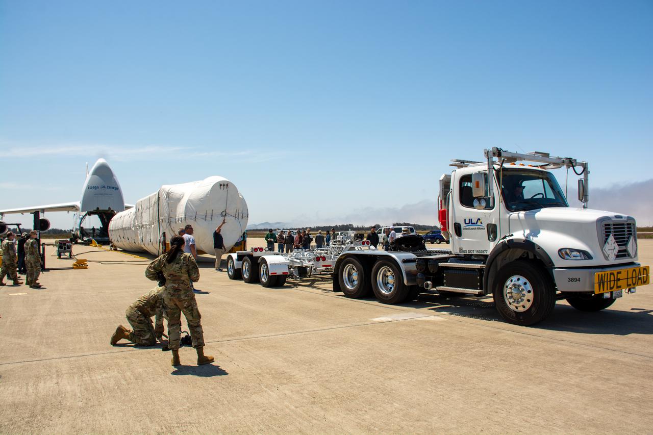 The United Launch Alliance (ULA) Atlas V booster for NASA’s Landsat 9 mission is offloaded from the Antonov 124 cargo aircraft and prepared for transport to the Horizontal Integration Facility at Vandenberg Space Force Base in California, on June 29, 2021. The Landsat 9 mission will launch atop a ULA Atlas V rocket from Vandenberg in September 2021. The launch is being managed by NASA’s Launch Services Program based at Kennedy Space Center. The Landsat 9 satellite will continue the nearly 50-year legacy of previous Landsat missions. It will monitor key natural and economic resources from orbit. Landsat 9 is managed by the agency’s Goddard Space Flight Center in Greenbelt, Maryland. The satellite will carry two instruments: the Operational Land Imager 2, which collects images of Earth’s landscapes in visible, near infrared and shortwave infrared light, and the Thermal Infrared Sensor 2, which measures the temperature of land surfaces. Like its predecessors, Landsat 9 is a joint mission between NASA and the U.S. Geological Survey. 