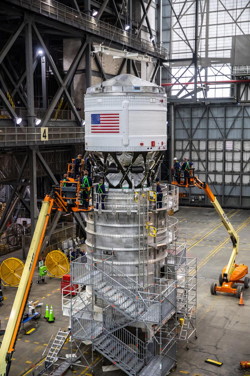 Teams with NASA’s Exploration Ground Systems and contractor Jacobs integrate the interim cryogenic propulsion stage (ICPS) for NASA’s Space Launch System (SLS) rocket with the launch vehicle stage adapter (LVSA) atop the massive SLS core stage in the agency’s Vehicle Assembly Building (VAB) at NASA’s Kennedy Space Center in Florida on July 5, 2021. The ICPS is a liquid oxygen and liquid hydrogen-based system that will fire its RL 10 engine to give the Orion spacecraft the big in-space push needed to fly tens of thousands of miles beyond the Moon. The next component to be stacked on top of ICPS will be the Orion stage adapter, which will connect the ICPS with the spacecraft. Through Artemis, NASA will send the first woman and the first person of color to the lunar surface, as well as establish a sustainable presence on and around the Moon. As the first in an increasingly complex set of missions, Artemis I will test SLS and Orion as an integrated system prior to crewed flights to the Moon.