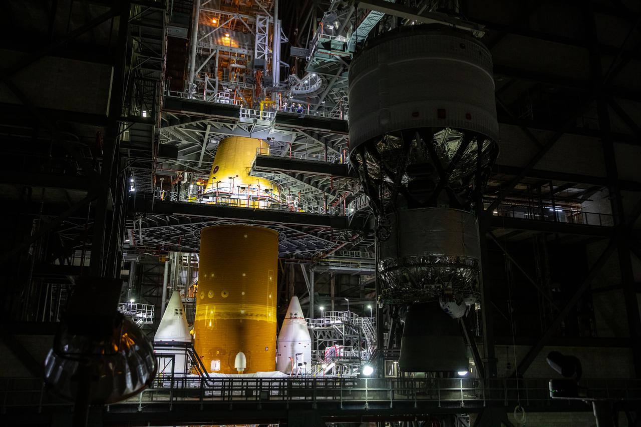 Teams with NASA’s Exploration Ground Systems and contractor Jacobs integrate the interim cryogenic propulsion stage (ICPS) for NASA’s Space Launch System (SLS) rocket with the launch vehicle stage adapter (LVSA) atop the massive SLS core stage in the agency’s Vehicle Assembly Building (VAB) at NASA’s Kennedy Space Center in Florida on July 5, 2021. The ICPS is a liquid oxygen and liquid hydrogen-based system that will fire its RL 10 engine to give the Orion spacecraft the big in-space push needed to fly tens of thousands of miles beyond the Moon. The next component to be stacked on top of ICPS will be the Orion stage adapter, which will connect the ICPS with the spacecraft. Through Artemis, NASA will send the first woman and the first person of color to the lunar surface, as well as establish a sustainable presence on and around the Moon. As the first in an increasingly complex set of missions, Artemis I will test SLS and Orion as an integrated system prior to crewed flights to the Moon.