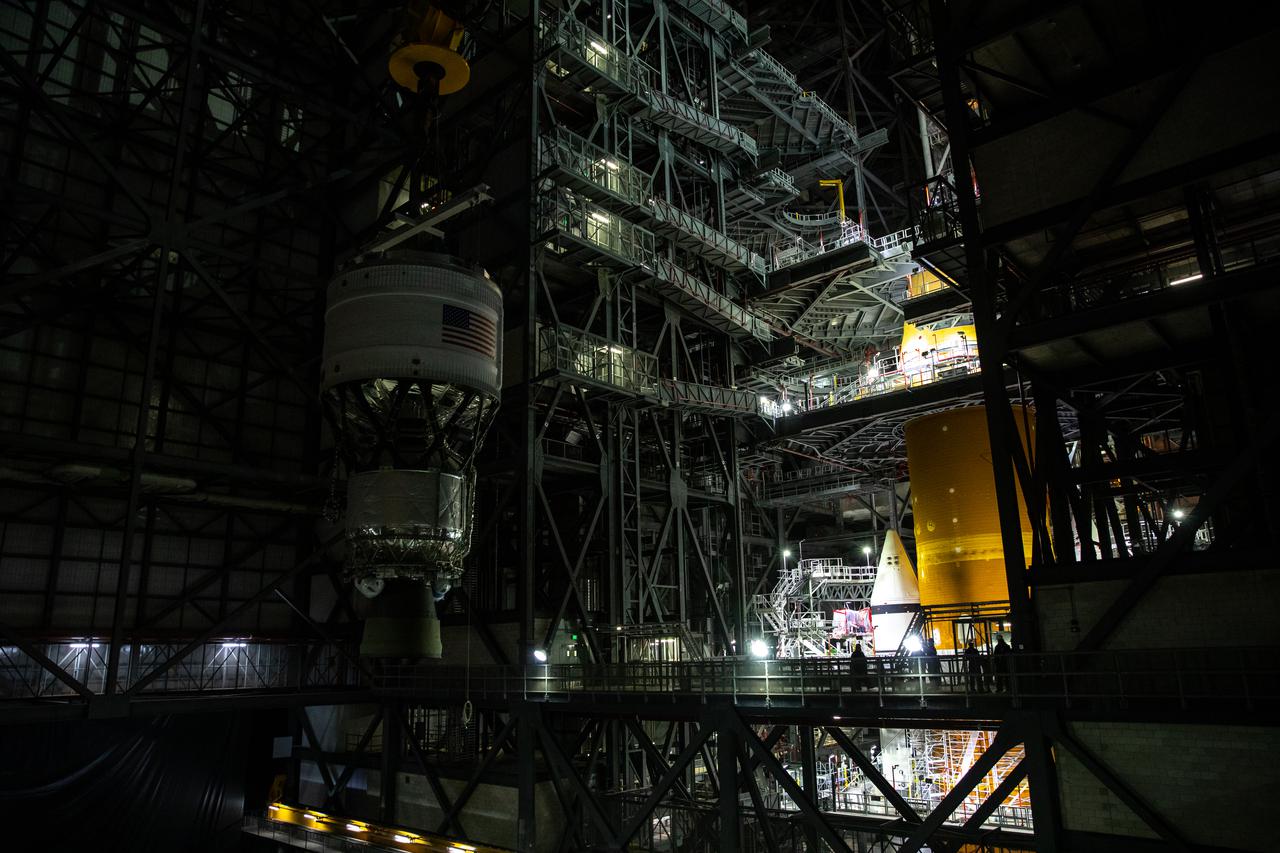 Teams with NASA’s Exploration Ground Systems and contractor Jacobs integrate the interim cryogenic propulsion stage (ICPS) for NASA’s Space Launch System (SLS) rocket with the launch vehicle stage adapter (LVSA) atop the massive SLS core stage in the agency’s Vehicle Assembly Building (VAB) at NASA’s Kennedy Space Center in Florida on July 5, 2021. The ICPS is a liquid oxygen and liquid hydrogen-based system that will fire its RL 10 engine to give the Orion spacecraft the big in-space push needed to fly tens of thousands of miles beyond the Moon. The next component to be stacked on top of ICPS will be the Orion stage adapter, which will connect the ICPS with the spacecraft. Through Artemis, NASA will send the first woman and the first person of color to the lunar surface, as well as establish a sustainable presence on and around the Moon. As the first in an increasingly complex set of missions, Artemis I will test SLS and Orion as an integrated system prior to crewed flights to the Moon.
