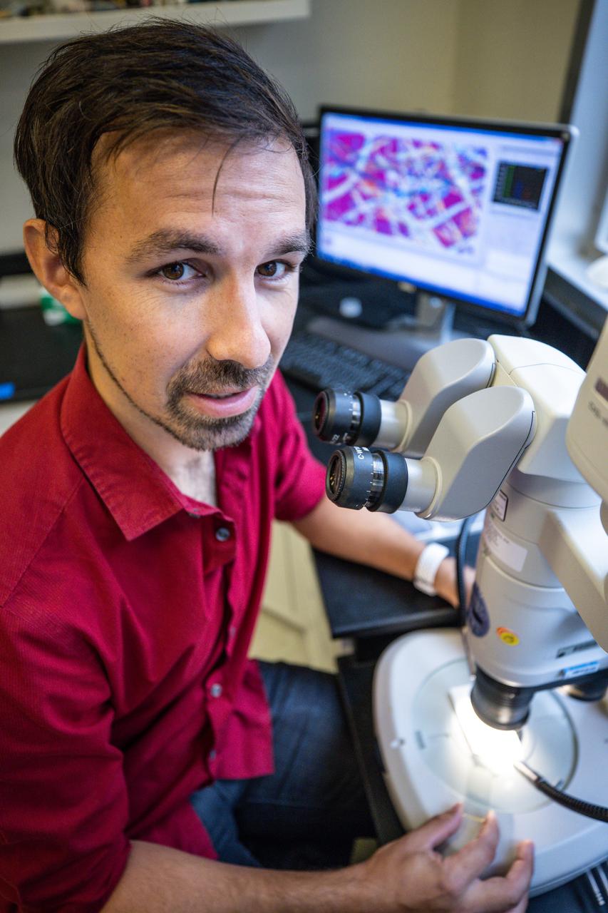 Chemist David Rinderknecht analyzes a sample on the stereomicroscope inside NASA Engineering’s Analytical Laboratories at Kennedy Space Center in Florida on July 7, 2021. One of seven branches in the NASA Laboratories, Development, and Testing Division, the Analytical Laboratories branch provides microscopic imagery and analysis through the use of a wide variety of microscopic techniques to identify contaminants and other urgent problems associated with aerospace flight hardware, ground support equipment, and related facilities. 