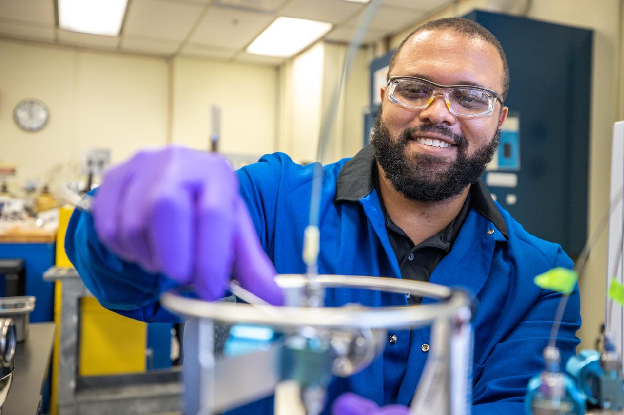Chemist Trey Barnes prepares a gas sample for injection into a gas chromatography-mass spectrometry system preconcentrator for analyzing trace level gas contaminants inside NASA Engineering’s Analytical Laboratories at Kennedy Space Center in Florida on July 7, 2021. One of seven branches in the NASA Laboratories, Development, and Testing Division, the Analytical Laboratories branch provides microscopic imagery and analysis through the use of a wide variety of microscopic techniques to identify contaminants and other urgent problems associated with aerospace flight hardware, ground support equipment, and related facilities. 