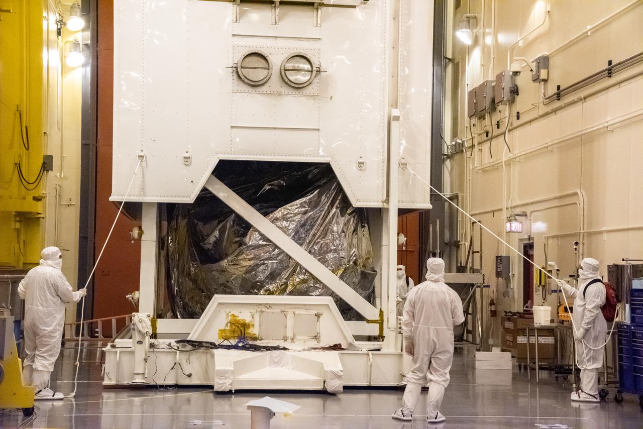 Technicians begin to remove the satellite for the Landsat 9 mission from its shipping container following its arrival at Vandenberg Space Force Base in California on July 7, 2021. The Landsat 9 mission will launch atop a United Launch Alliance Atlas V rocket from Vandenberg in September 2021. The launch is being managed by NASA’s Launch Services Program based at Kennedy Space Center in Florida, America’s multi-user spaceport. The Landsat 9 satellite will continue the nearly 50-year legacy of previous Landsat missions. It will monitor key natural and economic resources from orbit. Landsat 9 is managed by the agency’s Goddard Space Flight Center in Greenbelt, Maryland. The satellite will carry two instruments: the Operational Land Imager 2, which collects images of Earth’s landscapes in visible, near infrared and shortwave infrared light, and the Thermal Infrared Sensor 2, which measures the temperature of land surfaces. Like its predecessors, Landsat 9 is a joint mission between NASA and the U.S. Geological Survey.