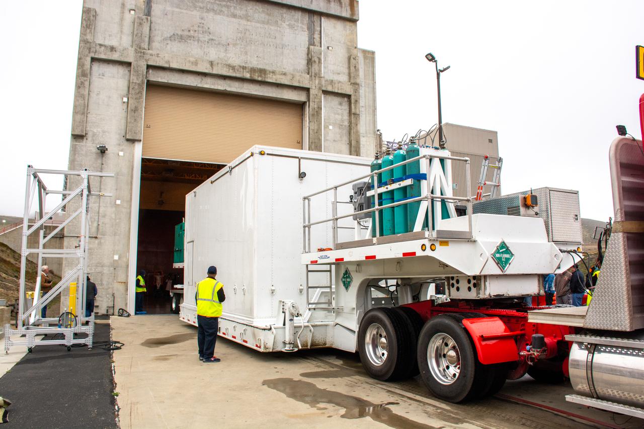 The satellite for the Landsat 9 mission, secured inside its shipping container, arrives at the Integrated Processing Facility at Vandenberg Space Force Base in California on July 7, 2021. The Landsat 9 mission will launch atop a United Launch Alliance Atlas V rocket from Vandenberg in September 2021. The launch is being managed by NASA’s Launch Services Program based at Kennedy Space Center in Florida, America’s multi-user spaceport. The Landsat 9 satellite will continue the nearly 50-year legacy of previous Landsat missions. It will monitor key natural and economic resources from orbit. Landsat 9 is managed by the agency’s Goddard Space Flight Center in Greenbelt, Maryland. The satellite will carry two instruments: the Operational Land Imager 2, which collects images of Earth’s landscapes in visible, near infrared and shortwave infrared light, and the Thermal Infrared Sensor 2, which measures the temperature of land surfaces. Like its predecessors, Landsat 9 is a joint mission between NASA and the U.S. Geological Survey.