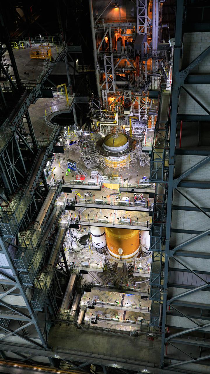Teams with NASA’s Exploration Ground Systems and contractor Jacobs integrated the interim cryogenic propulsion stage (ICPS) for NASA’s Space Launch System (SLS) rocket with the launch vehicle stage adapter (LVSA) atop the massive SLS core stage on the mobile launcher inside the agency’s Vehicle Assembly Building (VAB) at NASA’s Kennedy Space Center in Florida on July 5, 2021. The ICPS’s RL 10 engine is housed inside the launch vehicle stage adapter, which will protect the engine during launch. The ICPS is a liquid oxygen and liquid hydrogen-based system that will give the Orion spacecraft the big in-space push needed to fly tens of thousands of miles beyond the Moon. The next component to be stacked on top of ICPS will be the Orion stage adapter, which will connect the ICPS with the spacecraft. Through Artemis, NASA will send the first woman and the first person of color to the lunar surface, as well as establish a sustainable presence on and around the Moon. As the first in an increasingly complex set of missions, Artemis I will test SLS and Orion as an integrated system prior to crewed flights to the Moon.