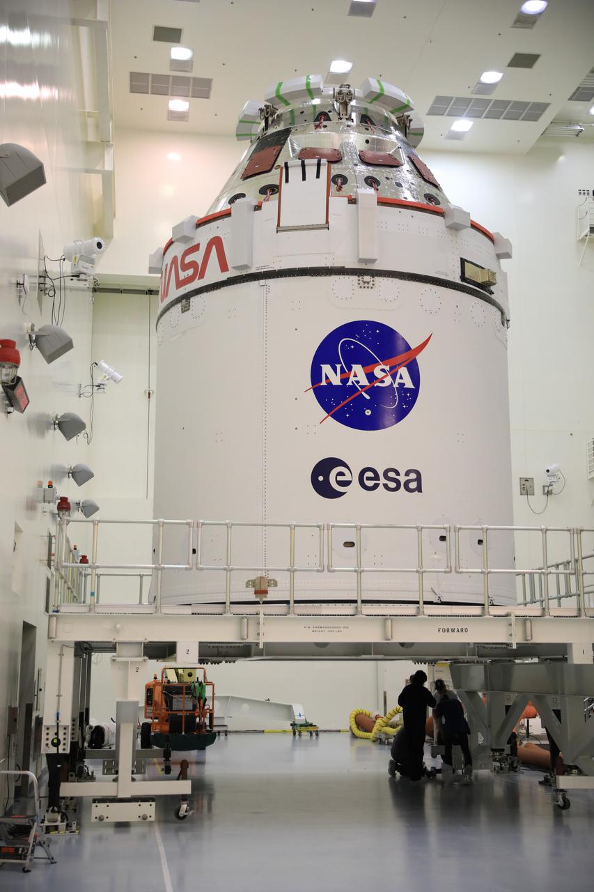 Fueling and servicing checks on the Orion spacecraft for the Artemis I mission are completed inside Kennedy Space Center’s Multi-Payload Processing Facility on July 8, 2021. The capsule will be transported to the Florida spaceport’s Launch Abort System Facility, where teams with Exploration Ground Systems and contractor Jacobs will work to add parts of the launch abort system onto the spacecraft. Launching later this year, Artemis I will be a test of the Orion spacecraft and SLS rocket as an integrated system ahead of crewed flights to the Moon.