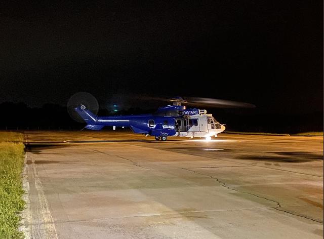 An Airbus H225 helicopter with cargo from SpaceX’s 22nd commercial resupply services mission lands during the early morning on July 10, 2021, at the Launch and Landing Facility at NASA’s Kennedy Space Center in Florida. From there, contractor Jacobs transported the cargo to the center’s Space Station Processing Facility (SSPF). After its successful parachute-assisted splashdown off the coast of Tallahassee, Florida, at 11:29 p.m. EST on Friday, July 9, the SpaceX cargo Dragon returned more than 5,300 pounds of scientific experiments and other cargo from the International Space Station. Splashing down off the coast of Florida enables quick transportation of the science aboard the capsule to the SSPF, delivering some science back into the hands of the researchers as soon as four to nine hours after splashdown. This shorter transportation timeframe allows researchers to collect data with minimal loss of microgravity effects.