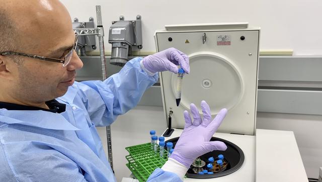 Senior Scientist George Makedonas, from NASA’S Human Immunology and Virology Lab, works with blood samples returned to Earth on SpaceX’s 22nd commercial resupply services mission in the Space Station Processing Facility (SSPF) at Kennedy Space Center in Florida, on July 10, 2021. After its successful parachute-assisted splashdown off the coast of Tallahassee, Florida at 11:29 p.m. EST on Friday, July 9, the SpaceX cargo Dragon returned more than 5,300 pounds of scientific experiments and other cargo from the International Space Station. Splashing down off the coast of Florida enables quick transportation of the science aboard the capsule to the SSPF, delivering some science back into the hands of the researchers as soon as four to nine hours after splashdown. This shorter transportation timeframe allows researchers to collect data with minimal loss of microgravity effects. 