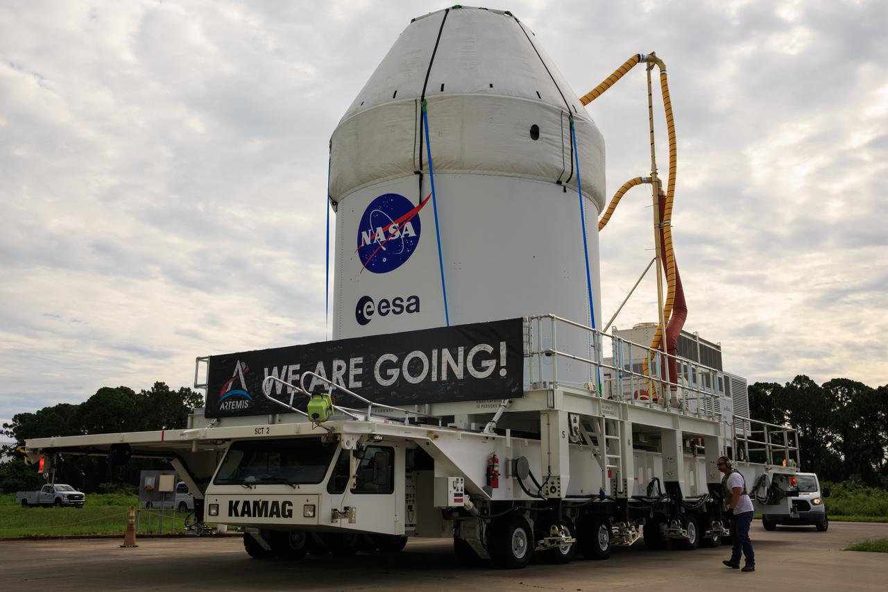 The Orion spacecraft for the Artemis I mission is transported from Kennedy Space Center’s Multi-Payload Processing Facility to the Florida spaceport’s Launch Abort System Facility on July 10, 2021. Teams with Exploration Ground Systems and contractor Jacobs will integrate components of the launch abort system onto the spacecraft. Launching later this year, Artemis I will be a test of the Orion spacecraft and SLS rocket as an integrated system ahead of crewed flights to the Moon.