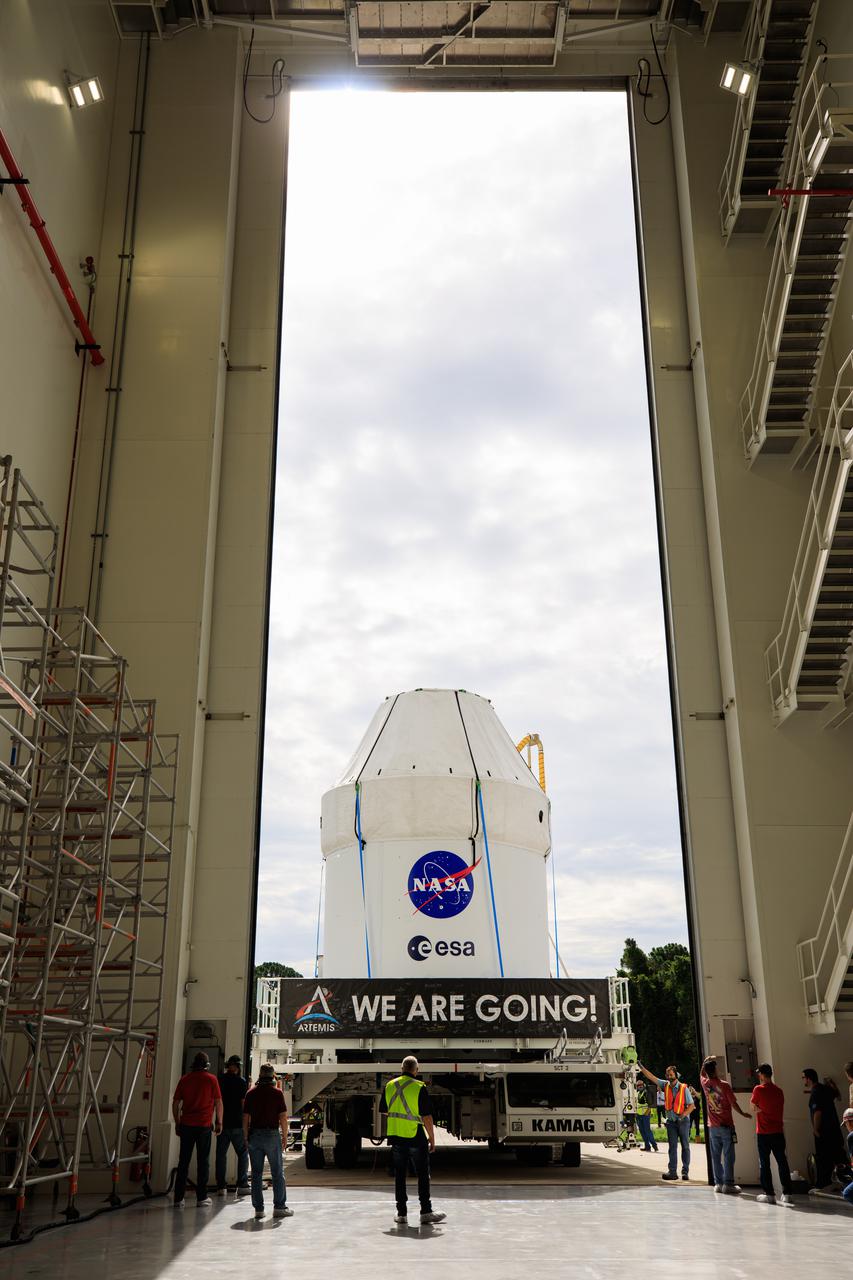 The Orion spacecraft for the Artemis I mission arrives at Kennedy Space Center’s Launch Abort System facility on July 10, 2021, after being transported from the Florida spaceport’s Multi-Payload Processing Facility earlier in the day. Teams with Exploration Ground Systems and contractor Jacobs will integrate components of the launch abort system onto the spacecraft. Launching later this year, Artemis I will be a test of the Orion spacecraft and SLS rocket as an integrated system ahead of crewed flights to the Moon.