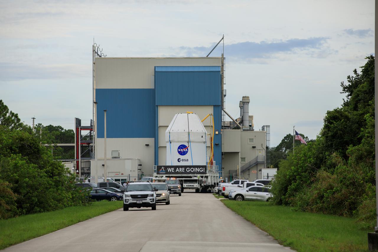 After recently completing fueling and servicing checks, the Orion spacecraft for the Artemis I mission departs Kennedy Space Center’s Multi-Payload Processing on July 10, 2021. The capsule is being transported to the Florida spaceport’s Launch Abort System Facility, where teams with Exploration Ground Systems and contractor Jacobs will integrate components of the launch abort system onto the spacecraft. Launching later this year, Artemis I will be a test of the Orion spacecraft and SLS rocket as an integrated system ahead of crewed flights to the Moon.