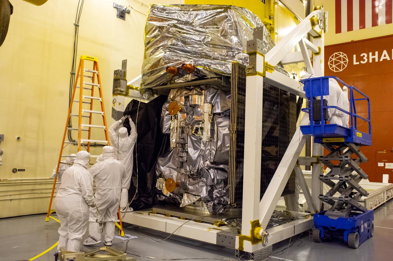Inside the Integrated Processing Facility at Vandenberg Space Force Base in California, technicians have completed lifting and rotating NASA’s Landsat 9 observatory on July 11, 2021. Landsat 9 will launch on an Atlas V rocket from Space Launch Complex 3 at Vandenberg in September 2021. The launch is being managed by NASA’s Launch Services Program based at Kennedy Space Center, America’s multiuser spaceport. The Landsat 9 satellite will continue the nearly 50-year legacy of previous Landsat missions. It will monitor key natural and economic resources from orbit. Landsat 9 is managed by the agency’s Goddard Space Flight Center in Greenbelt, Maryland. The satellite will carry two instruments: the Operational Land Imager 2, which collects images of Earth’s landscapes in visible, near infrared and shortwave infrared light, and the Thermal Infrared Sensor 2, which measures the temperature of land surfaces. Like its predecessors, Landsat 9 is a joint mission between NASA and the U.S. Geological Survey. 