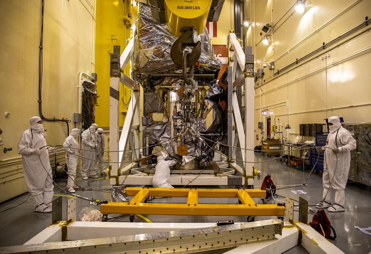 Inside the Integrated Processing Facility at Vandenberg Space Force Base in California, technicians prepare NASA’s Landsat 9 observatory for its lift to a fixture structure on July 12, 2021. Landsat 9 will launch on a United Launch Alliance Atlas V rocket from Space Launch Complex 3 at Vandenberg in September 2021. The launch is being managed by NASA’s Launch Services Program based at Kennedy Space Center, America’s multiuser spaceport. The Landsat 9 satellite will continue the nearly 50-year legacy of previous Landsat missions. It will monitor key natural and economic resources from orbit. Landsat 9 is managed by the agency’s Goddard Space Flight Center in Greenbelt, Maryland. The satellite will carry two instruments: the Operational Land Imager 2, which collects images of Earth’s landscapes in visible, near infrared and shortwave infrared light, and the Thermal Infrared Sensor 2, which measures the temperature of land surfaces. Like its predecessors, Landsat 9 is a joint mission between NASA and the U.S. Geological Survey.