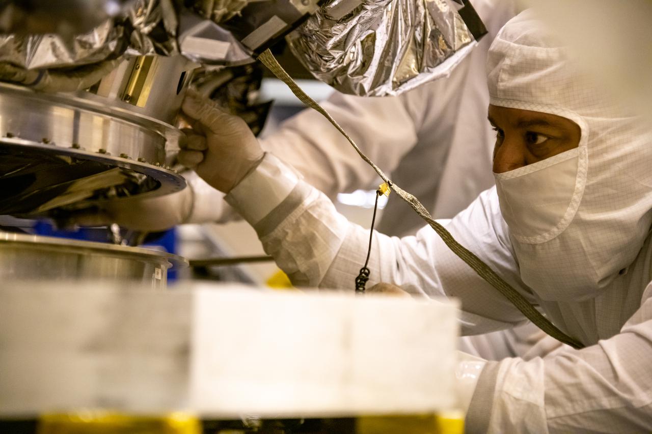 Inside the Integrated Processing Facility at Vandenberg Space Force Base in California, technicians prepare NASA’s Landsat 9 observatory for its lift to a fixture structure on July 12, 2021. Landsat 9 will launch on a United Launch Alliance Atlas V rocket from Space Launch Complex 3 at Vandenberg in September 2021. The launch is being managed by NASA’s Launch Services Program based at Kennedy Space Center, America’s multiuser spaceport. The Landsat 9 satellite will continue the nearly 50-year legacy of previous Landsat missions. It will monitor key natural and economic resources from orbit. Landsat 9 is managed by the agency’s Goddard Space Flight Center in Greenbelt, Maryland. The satellite will carry two instruments: the Operational Land Imager 2, which collects images of Earth’s landscapes in visible, near infrared and shortwave infrared light, and the Thermal Infrared Sensor 2, which measures the temperature of land surfaces. Like its predecessors, Landsat 9 is a joint mission between NASA and the U.S. Geological Survey.