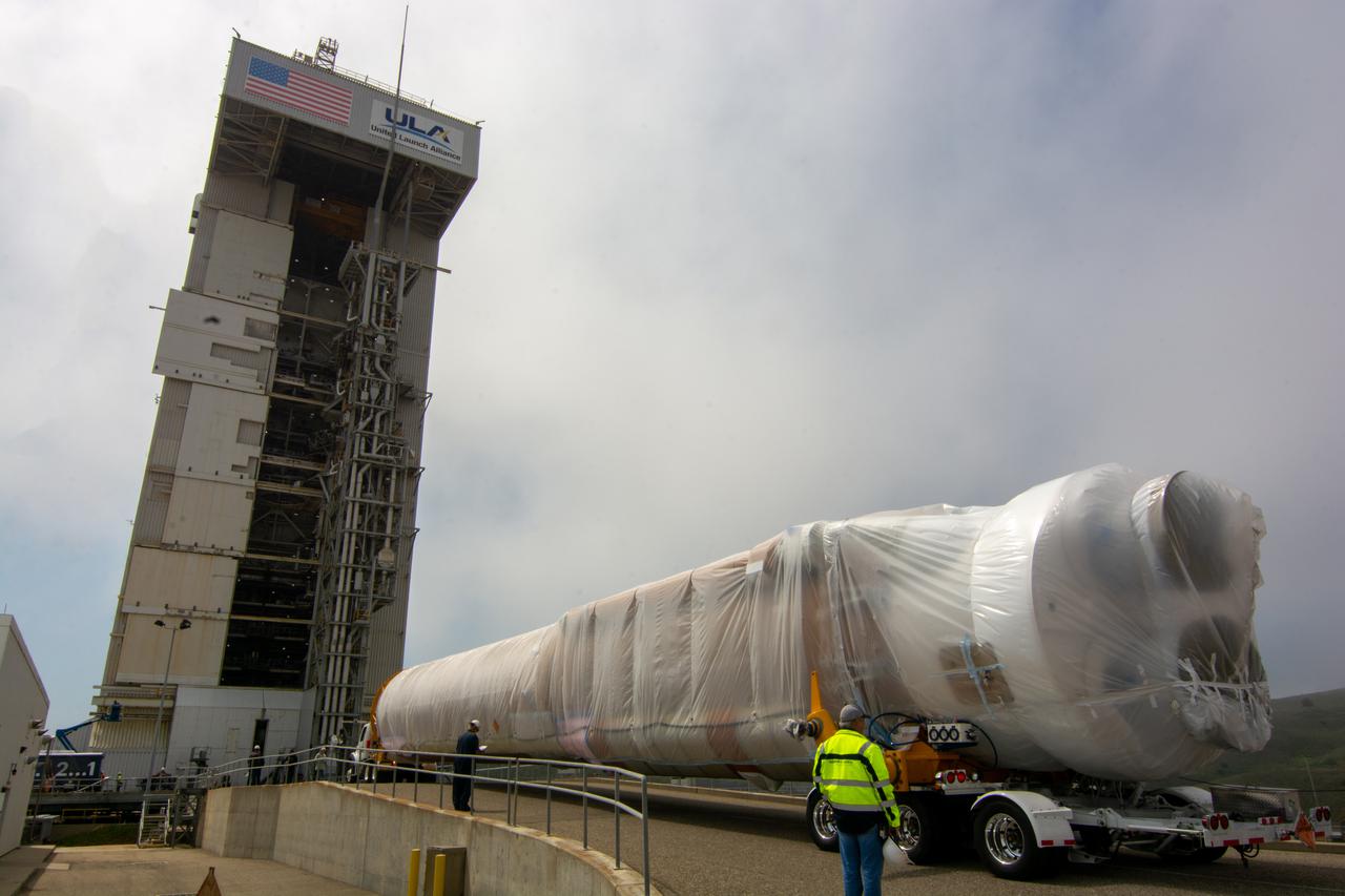 The United Launch Alliance Atlas V booster for NASA’s Landsat 9 mission arrives at the Vertical Integration Facility at Space Launch Complex 3 at Vandenberg Space Force Base in California, on July 12, 2021. The Landsat 9 mission will launch atop the Atlas V rocket from Vandenberg in September 2021. The launch is being managed by NASA’s Launch Services Program based at Kennedy Space Center. The Landsat 9 satellite will continue the nearly 50-year legacy of previous Landsat missions. It will monitor key natural and economic resources from orbit. Landsat 9 is managed by the agency’s Goddard Space Flight Center in Greenbelt, Maryland. The satellite will carry two instruments: the Operational Land Imager 2, which collects images of Earth’s landscapes in visible, near infrared and shortwave infrared light, and the Thermal Infrared Sensor 2, which measures the temperature of land surfaces. Like its predecessors, Landsat 9 is a joint mission between NASA and the U.S. Geological Survey. 