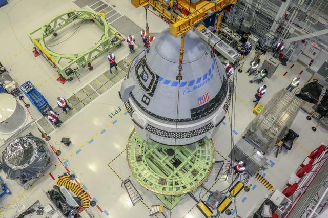 Boeing’s CST-100 Starliner undergoes weight and center of gravity checks in the Commercial Crew and Cargo Processing Facility at Kennedy Space Center in Florida on July 13, 2021. The operations are in preparation for the company’s second Orbital Flight Test (OFT-2), as part of NASA’s Commercial Crew Program.