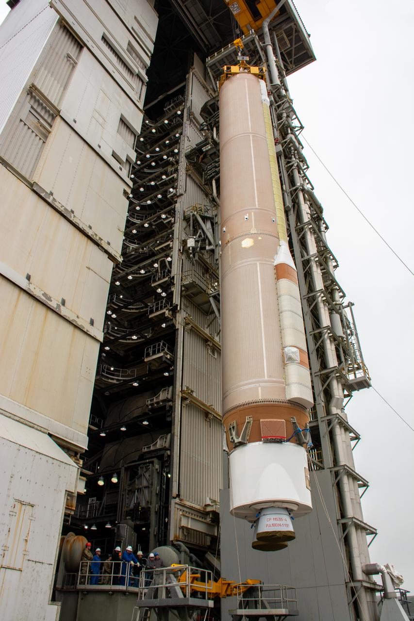 The United Launch Alliance Atlas V booster for NASA’s Landsat 9 mission is lifted by crane for its move into the Vertical Integration Facility at Space Launch Complex 3 at Vandenberg Space Force Base in California, on July 13, 2021. The Landsat 9 mission will launch atop the Atlas V rocket from Vandenberg in September 2021. The launch is being managed by NASA’s Launch Services Program based at Kennedy Space Center. The Landsat 9 satellite will continue the nearly 50-year legacy of previous Landsat missions. It will monitor key natural and economic resources from orbit. Landsat 9 is managed by the agency’s Goddard Space Flight Center in Greenbelt, Maryland. The satellite will carry two instruments: the Operational Land Imager 2, which collects images of Earth’s landscapes in visible, near infrared and shortwave infrared light, and the Thermal Infrared Sensor 2, which measures the temperature of land surfaces. Like its predecessors, Landsat 9 is a joint mission between NASA and the U.S. Geological Survey. 