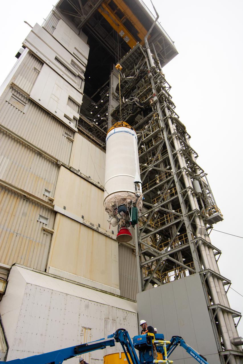 The United Launch Alliance Centaur second stage for NASA’s Landsat 9 mission is lifted high by crane for transfer into the Vertical Integration Facility at Space Launch Complex 3 at Vandenberg Space Force Base in California, on July 15, 2021. The Centaur will be attached to the top of the Atlas V rocket. The Landsat 9  mission will launch atop the Atlas V rocket from Vandenberg in September 2021. The launch is being managed by NASA’s Launch Services Program based at Kennedy Space Center, America’s multiuser spaceport. The Landsat 9 satellite will continue the nearly 50-year legacy of previous Landsat missions. It will monitor key natural and economic resources from orbit. Landsat 9 is managed by the agency’s Goddard Space Flight Center in Greenbelt, Maryland. The satellite will carry two instruments: the Operational Land Imager 2, which collects images of Earth’s landscapes in visible, near infrared and shortwave infrared light, and the Thermal Infrared Sensor 2, which measures the temperature of land surfaces. Like its predecessors, Landsat 9 is a joint mission between NASA and the U.S. Geological Survey.
