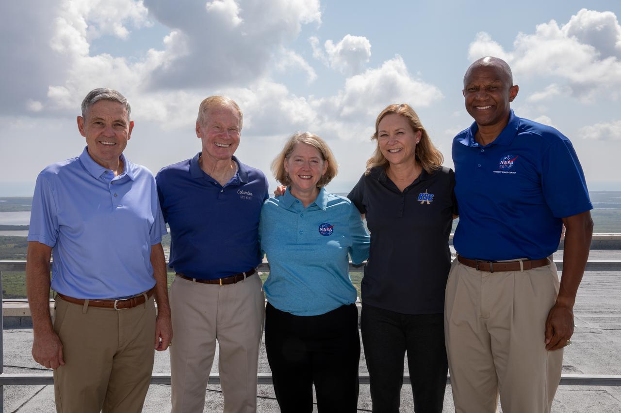 From left: NASA Associate Administrator Bob Cabana, NASA Administrator Bill Nelson, NASA Deputy Administrator Pam Melroy, Kennedy Space Center Director Janet Petro, and Kennedy Deputy Director Kelvin Manning pose for a photo while touring the Vehicle Assembly Building (VAB) at the Florida spaceport on July 28, 2021. While inside the VAB, they had the opportunity to view the Space Launch System (SLS) rocket as preparations for the Artemis I launch continue. The first in an increasingly complex set of missions, Artemis I will test SLS and Orion as an integrated system prior to crewed flights to the Moon. Through Artemis, NASA will land the first woman and first person of color on the lunar surface, as well as establish a sustainable presence on and around the Moon.