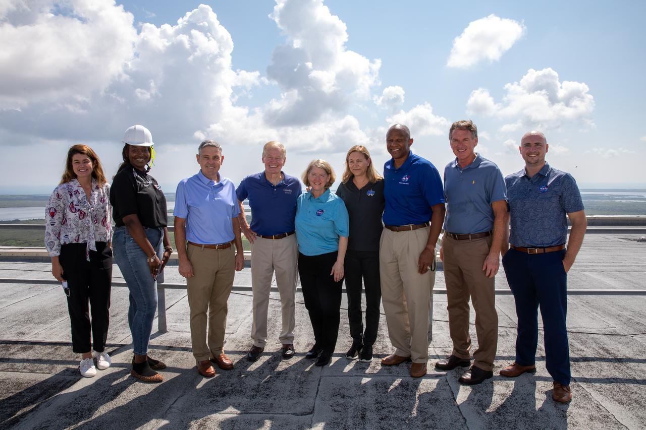 NASA and Kennedy Space Center leadership pose for a photo while touring the Vehicle Assembly Building (VAB) at the Florida spaceport on July 28, 2021. From left are NASA Headquarters’ Casey Swails; Tori Thompson, STEM intern for protocol; NASA Associate Administrator Bob Cabana; NASA Administrator Bill Nelson; NASA Deputy Administrator Pam Melroy; Kennedy Director Janet Petro; Kennedy Deputy Director Kelvin Manning; Mike Bolger, manager of NASA’s Exploration Ground Systems Program; and Executive Intern Peter Lyons. While inside the VAB, NASA senior leaders had the opportunity to view the Space Launch System (SLS) rocket as preparations for the Artemis I launch continue. The first in an increasingly complex set of missions, Artemis I will test SLS and Orion as an integrated system prior to crewed flights to the Moon. Through Artemis, NASA will land the first woman and first person of color on the lunar surface, as well as establish a sustainable presence on and around the Moon.