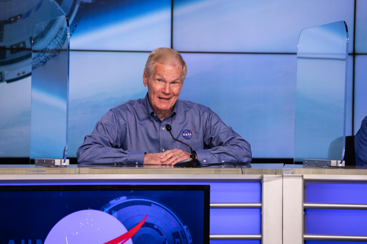 NASA Administrator Bill Nelson (center) speaks to the media ahead of Boeing’s Orbital Flight Test-2 (OFT-2) at the agency’s Kennedy Space Center in Florida, July 29, 2021. Boeing’s CST-100 Starliner spacecraft will launch atop a United Launch Alliance Atlas V rocket from Space Launch Complex-41 at Cape Canaveral Space Force Station. The uncrewed OFT-2 will be the Starliner’s second flight for NASA’s Commercial Crew Program.