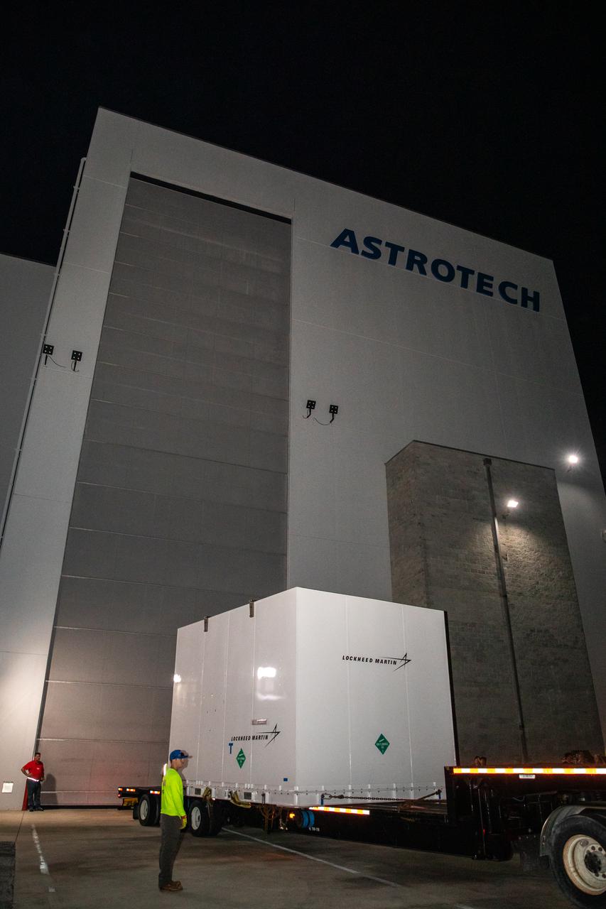 The shipping container holding NASA's Lucy spacecraft arrives at Astrotech Space Operations payload processing facility in Titusville, Florida on July 30, 2021. The facility, located near NASA's Kennedy Space Center, is where the Lucy spacecraft will undergo processing before its scheduled launch on a United Launch Alliance (ULA) Atlas V rocket from Cape Canaveral Space Force Station on October 16, 2021. The Lucy mission will be the first space mission to explore a diverse population of small bodies known as the Jupiter Trojan asteroids. The launch is being managed by NASA's Launch Services Program based at Kennedy, America's premier multi-user spaceport.