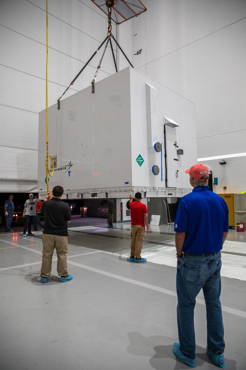 The shipping container holding NASA's Lucy spacecraft arrives at Astrotech Space Operations payload processing facility in Titusville, Florida on July 30, 2021. The facility, located near NASA's Kennedy Space Center, is where the Lucy spacecraft will undergo processing before its scheduled launch on a United Launch Alliance (ULA) Atlas V rocket from Cape Canaveral Space Force Station on October 16, 2021. The Lucy mission will be the first space mission to explore a diverse population of small bodies known as the Jupiter Trojan asteroids. The launch is being managed by NASA's Launch Services Program based at Kennedy, America's premier multi-user spaceport.