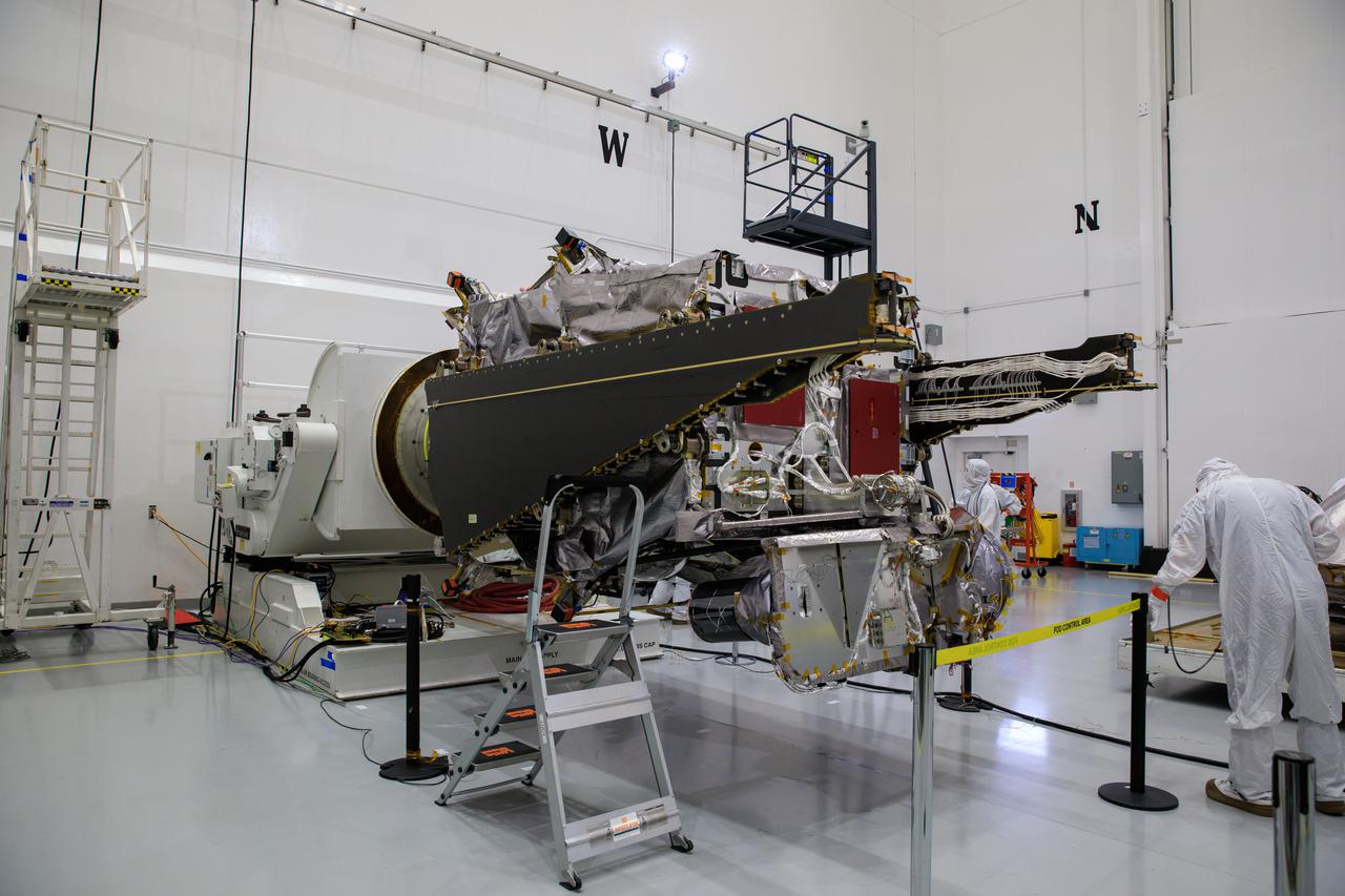 Workers inside the Astrotech Space Operations Facility in Titusville, Florida, prepare NASA’s Lucy spacecraft for installation of the high gain antenna on Aug. 6, 2021. Lucy is scheduled to launch no earlier than Saturday, Oct. 16, on a United Launch Alliance Atlas V 401 rocket from Launch Pad 41 at Cape Canaveral Space Force Station. NASA’s Launch Services Program based at Kennedy Space Center is managing the launch. Over its 12-year primary mission, Lucy will explore a record-breaking number of asteroids, flying by one asteroid in the solar system’s main belt and seven Trojan asteroids. Additionally, Lucy’s path will circle back to Earth three times for gravity assists, making it the first spacecraft ever to return to the vicinity of Earth from the outer solar system.