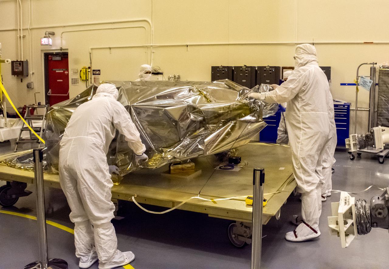 On Aug. 9, 2021, technicians ready the evolved expendable vehicle secondary payload adapter (ESPA) for mating operations in preparation for NASA’s Landsat 9 mission at Vandenberg Space Force Base in California. The ESPA connects the Landsat 9 spacecraft and the payload adapter – the payload adapter then attaches to the second stage of a United Launch Alliance Atlas V rocket. Landsat 9 will launch on the Atlas V from Space Launch Complex 3 at Vandenberg in September 2021. The launch is being managed by NASA’s Launch Services Program based at Kennedy Space Center, America’s multi-user spaceport. The Landsat 9 satellite will continue the nearly 50-year legacy of previous Landsat missions. It will monitor key natural and economic resources from orbit. Landsat 9 is managed by the agency’s Goddard Space Flight Center in Greenbelt, Maryland. The satellite will carry two instruments: the Operational Land Imager 2, which collects images of Earth’s landscapes in visible, near infrared and shortwave infrared light, and the Thermal Infrared Sensor 2, which measures the temperature of land surfaces. Like its predecessors, Landsat 9 is a joint mission between NASA and the U.S. Geological Survey.