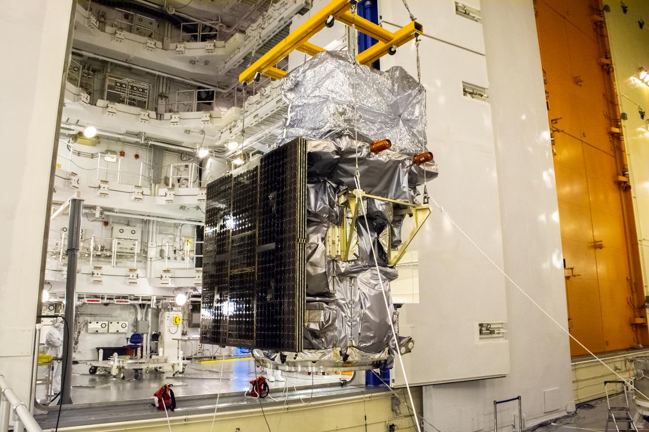 Technicians move the Landsat 9 spacecraft over to the evolved expendable vehicle secondary payload adapter (ESPA) for mating operations inside the Vertical Integration Facility at Vandenberg Space Force Base in California on Aug. 11, 2021. The ESPA connects  Landsat 9 and the payload adapter (PMA) – the PMA then will attach to the second stage of a United Launch Alliance Atlas V rocket. Landsat 9 will launch on the Atlas V from Space Launch Complex 3 at Vandenberg in September 2021. The launch is being managed by NASA’s Launch Services Program based at Kennedy Space Center, America’s multi-user spaceport. The Landsat 9 satellite will continue the nearly 50-year legacy of previous Landsat missions. It will monitor key natural and economic resources from orbit. Landsat 9 is managed by the agency’s Goddard Space Flight Center in Greenbelt, Maryland. The satellite will carry two instruments: the Operational Land Imager 2, which collects images of Earth’s landscapes in visible, near infrared and shortwave infrared light, and the Thermal Infrared Sensor 2, which measures the temperature of land surfaces. Like its predecessors, Landsat 9 is a joint mission between NASA and the U.S. Geological Survey.