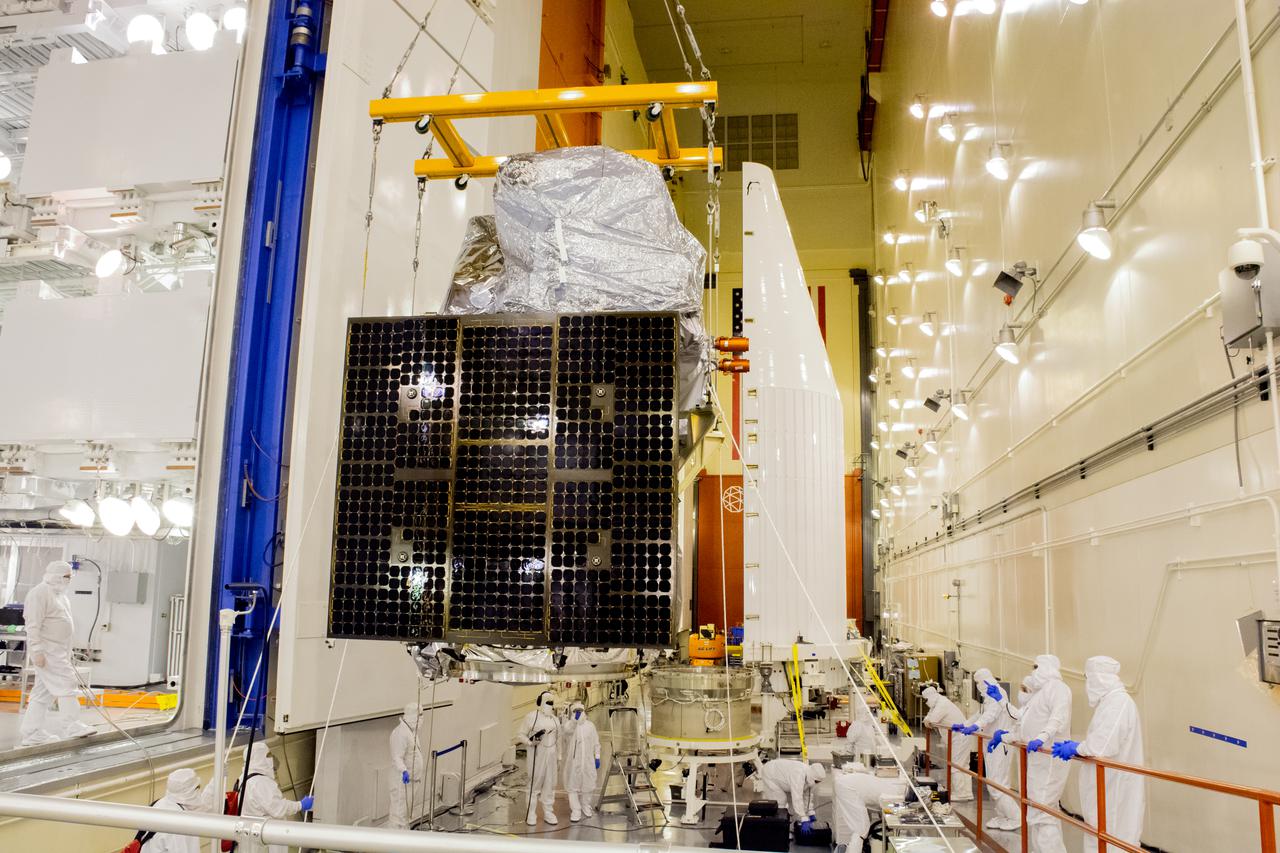 Technicians move the Landsat 9 spacecraft over to the evolved expendable vehicle secondary payload adapter (ESPA) for mating operations inside the Vertical Integration Facility at Vandenberg Space Force Base in California on Aug. 11, 2021. The ESPA connects Landsat 9 and the payload adapter (PMA) – the PMA then will attach to the second stage of a United Launch Alliance Atlas V rocket. Landsat 9 will launch on the Atlas V from Space Launch Complex 3 at Vandenberg in September 2021. The launch is being managed by NASA’s Launch Services Program based at Kennedy Space Center, America’s multi-user spaceport. The Landsat 9 satellite will continue the nearly 50-year legacy of previous Landsat missions. It will monitor key natural and economic resources from orbit. Landsat 9 is managed by the agency’s Goddard Space Flight Center in Greenbelt, Maryland. The satellite will carry two instruments: the Operational Land Imager 2, which collects images of Earth’s landscapes in visible, near infrared and shortwave infrared light, and the Thermal Infrared Sensor 2, which measures the temperature of land surfaces. Like its predecessors, Landsat 9 is a joint mission between NASA and the U.S. Geological Survey.