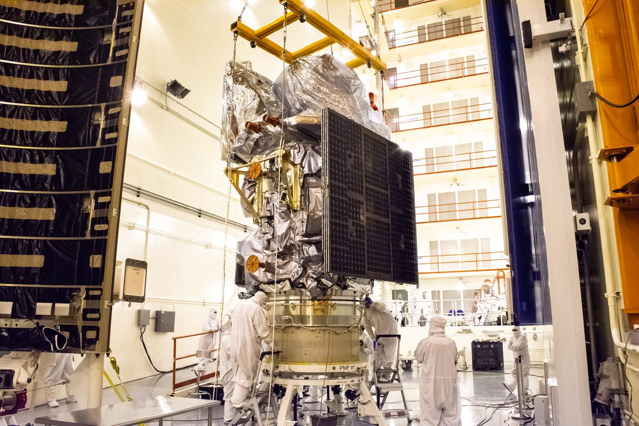 Technicians attach the Landsat 9 spacecraft to the evolved expendable vehicle secondary payload adapter (ESPA) inside the Vertical Integration Facility at Vandenberg Space Force Base in California on Aug. 11, 2021. The ESPA connects Landsat 9 and the payload adapter (PMA) – the PMA then will attach to the second stage of a United Launch Alliance Atlas V rocket. Landsat 9 will launch on the Atlas V from Space Launch Complex 3 at Vandenberg in September 2021. The launch is being managed by NASA’s Launch Services Program based at Kennedy Space Center, America’s multi-user spaceport. The Landsat 9 satellite will continue the nearly 50-year legacy of previous Landsat missions. It will monitor key natural and economic resources from orbit. Landsat 9 is managed by the agency’s Goddard Space Flight Center in Greenbelt, Maryland. The satellite will carry two instruments: the Operational Land Imager 2, which collects images of Earth’s landscapes in visible, near infrared and shortwave infrared light, and the Thermal Infrared Sensor 2, which measures the temperature of land surfaces. Like its predecessors, Landsat 9 is a joint mission between NASA and the U.S. Geological Survey.