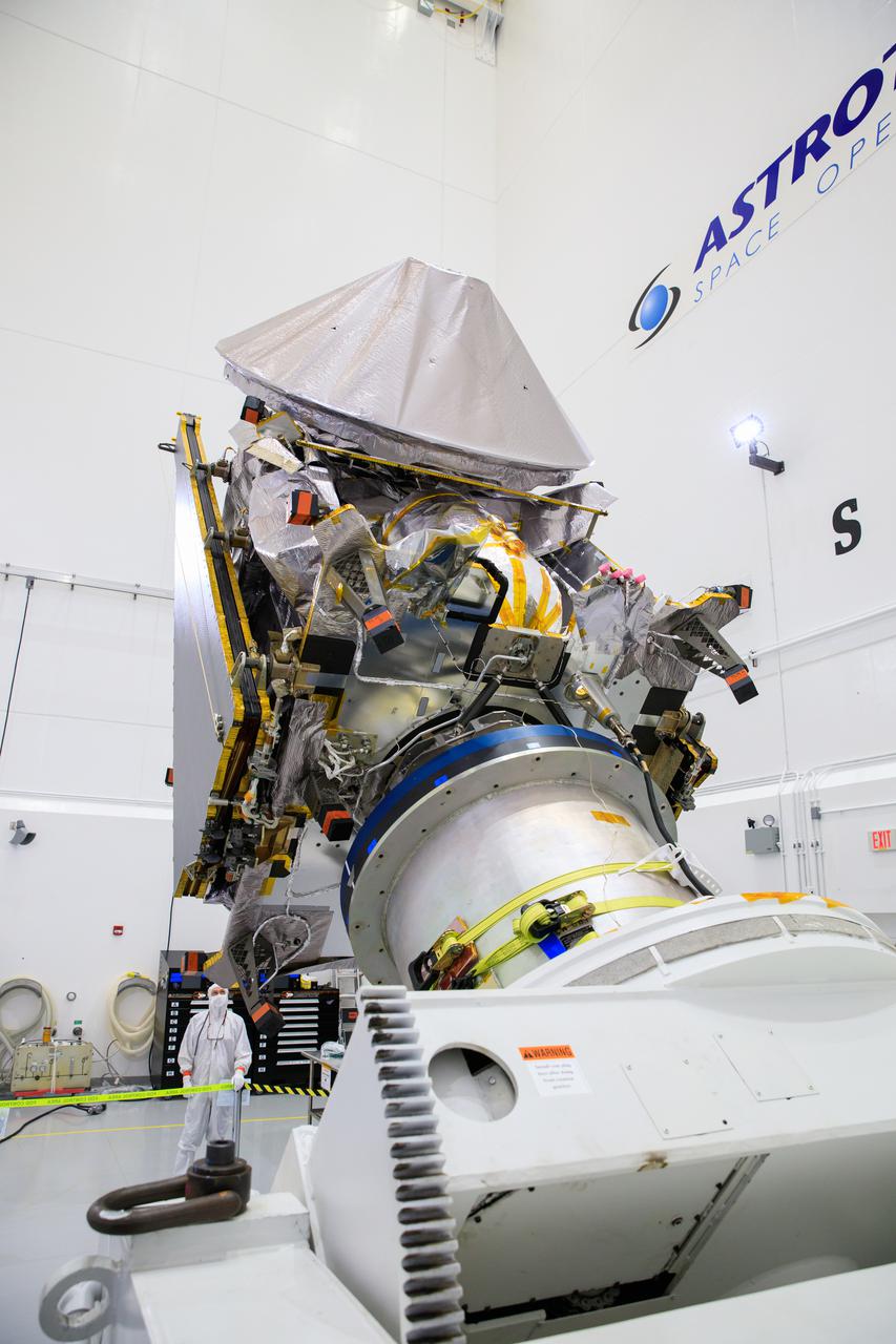 NASA’s Lucy spacecraft is moved to the horizontal position on a rotation stand inside the Astrotech Space Operations Facility in Titusville, Florida, on Sept. 1, 2021. In view, the high gain antenna and solar arrays have been installed on the Lucy spacecraft. Lucy is scheduled to launch no earlier than Saturday, Oct. 16, on a United Launch Alliance Atlas V 401 rocket from Launch Pad 41 at Cape Canaveral Space Force Station. NASA’s Launch Services Program based at Kennedy Space Center is managing the launch. Over its 12-year primary mission, Lucy will explore a record-breaking number of asteroids, flying by one asteroid in the solar system’s main belt and seven Trojan asteroids. Additionally, Lucy’s path will circle back to Earth three times for gravity assists, making it the first spacecraft ever to return to the vicinity of Earth from the outer solar system. 