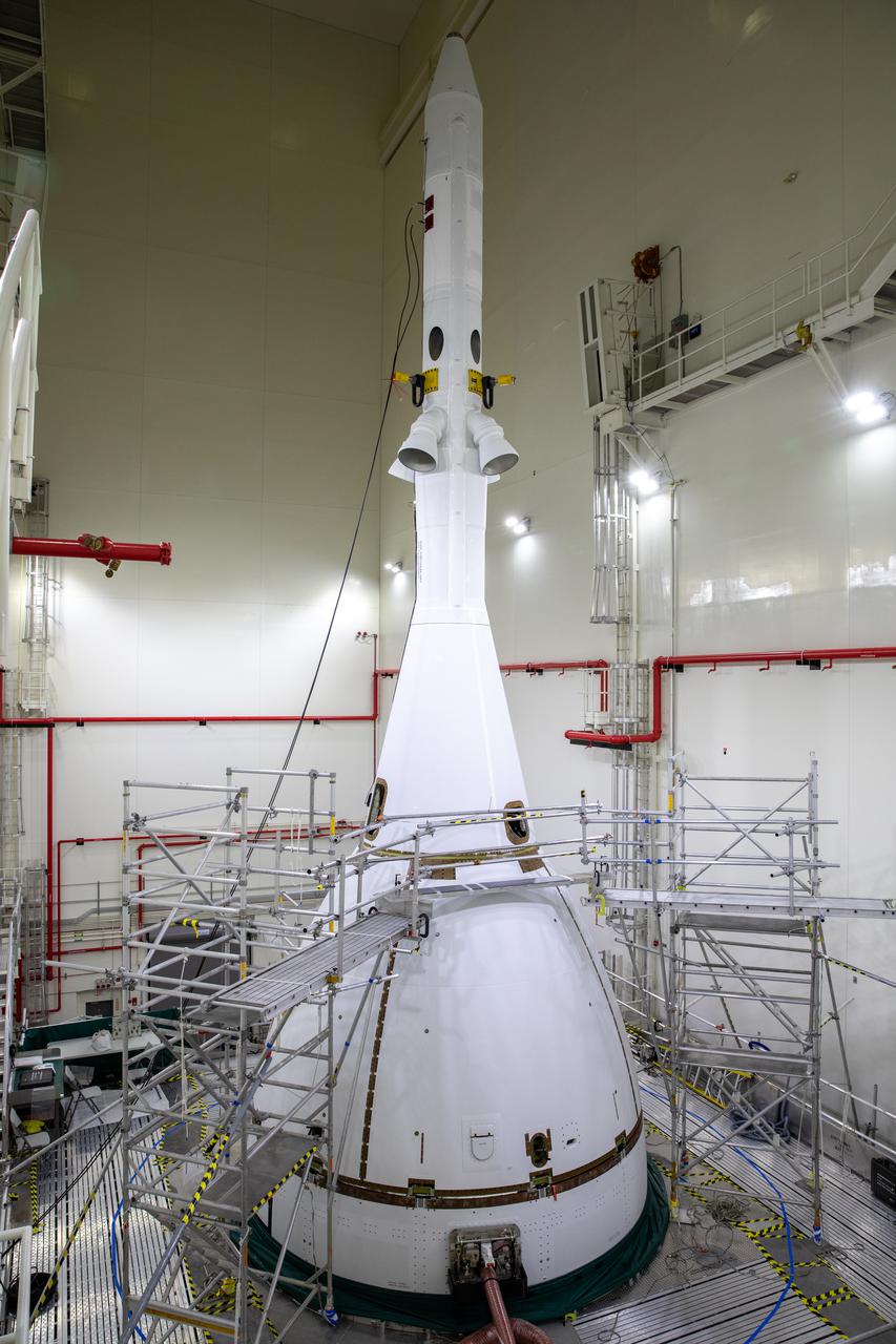 The third ogive fairing for the Orion spacecraft that will fly on the Artemis I mission is attached to the spacecraft’s launch abort system (LAS) inside the Launch Abort System Facility high bay at NASA’s Kennedy Space Center in Florida on Sept. 1, 2021. The ogives consist of four protective panels that will shield the crew module from the severe vibrations and sounds it will experience during launch. During Artemis missions, the 44-foot-tall LAS will detach from the spacecraft when it is no longer needed. Launching in 2021, Artemis I will be an uncrewed test of Orion and the Space Launch System rocket as an integrated system ahead of crewed flights to the Moon. Under Artemis, NASA aims to land the first woman and first person of color on the Moon and establish a long-term presence in lunar orbit.