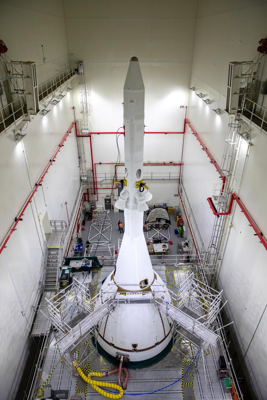 The third ogive fairing for the Orion spacecraft that will fly on the Artemis I mission is attached to the spacecraft’s launch abort system (LAS) inside the Launch Abort System Facility high bay at NASA’s Kennedy Space Center in Florida on Sept. 1, 2021. The ogives consist of four protective panels that will shield the crew module from the severe vibrations and sounds it will experience during launch. During Artemis missions, the 44-foot-tall LAS will detach from the spacecraft when it is no longer needed. Launching in 2021, Artemis I will be an uncrewed test of Orion and the Space Launch System rocket as an integrated system ahead of crewed flights to the Moon. Under Artemis, NASA aims to land the first woman and first person of color on the Moon and establish a long-term presence in lunar orbit.