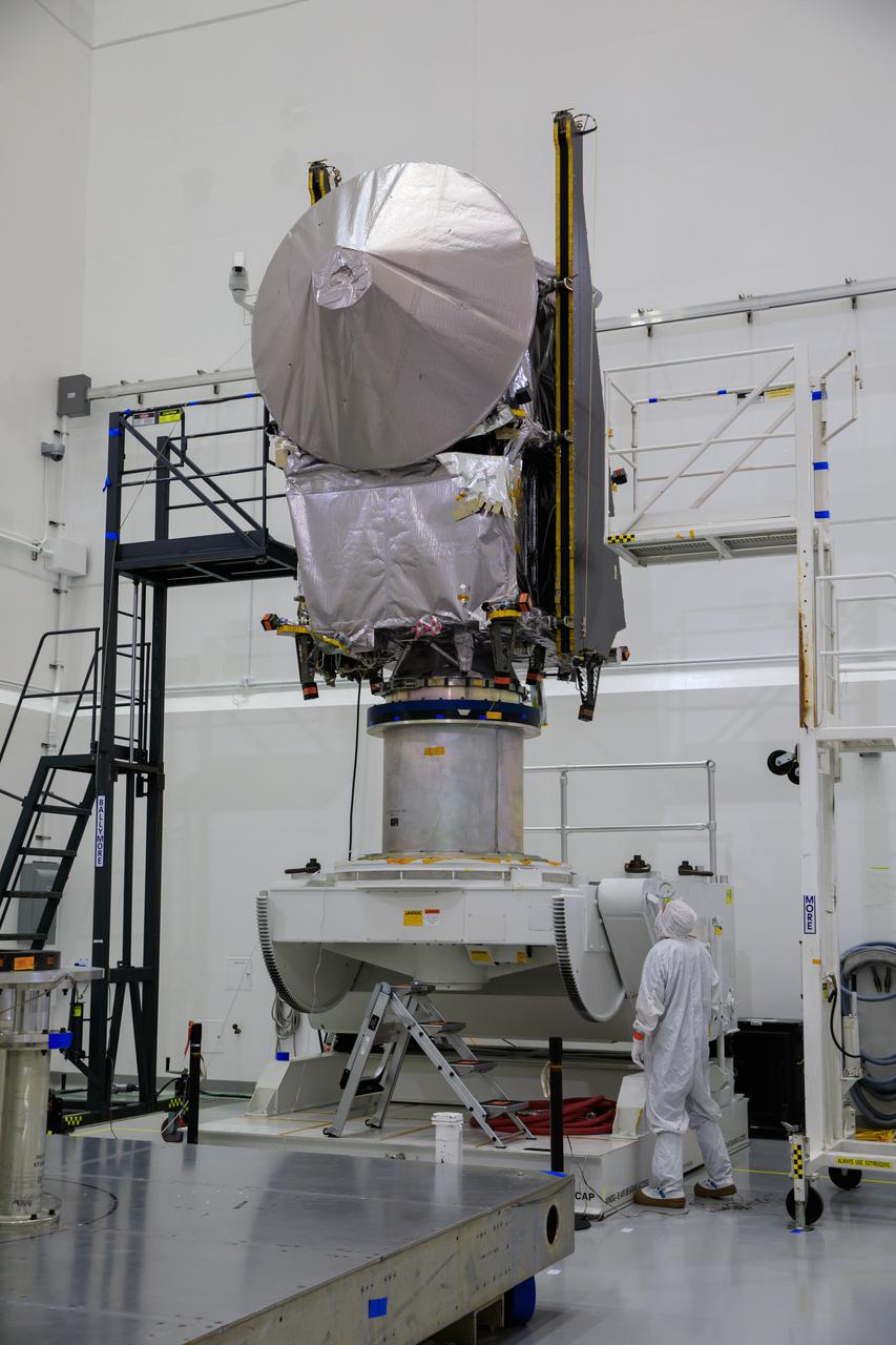 NASA’s Lucy spacecraft, with its high gain antenna attached, is on a rotation stand inside the Astrotech Space Operations Facility in Titusville, Florida on Sept. 8, 2021. Lucy is scheduled to launch no earlier than Saturday, Oct. 16, on a United Launch Alliance Atlas V 401 rocket from Launch Pad 41 at Cape Canaveral Space Force Station. NASA’s Launch Services Program based at Kennedy Space Center is managing the launch. Over its 12-year primary mission, Lucy will explore a record-breaking number of asteroids, flying by one asteroid in the solar system’s main belt and seven Trojan asteroids. Additionally, Lucy’s path will circle back to Earth three times for gravity assists, making it the first spacecraft ever to return to the vicinity of Earth from the outer solar system. 