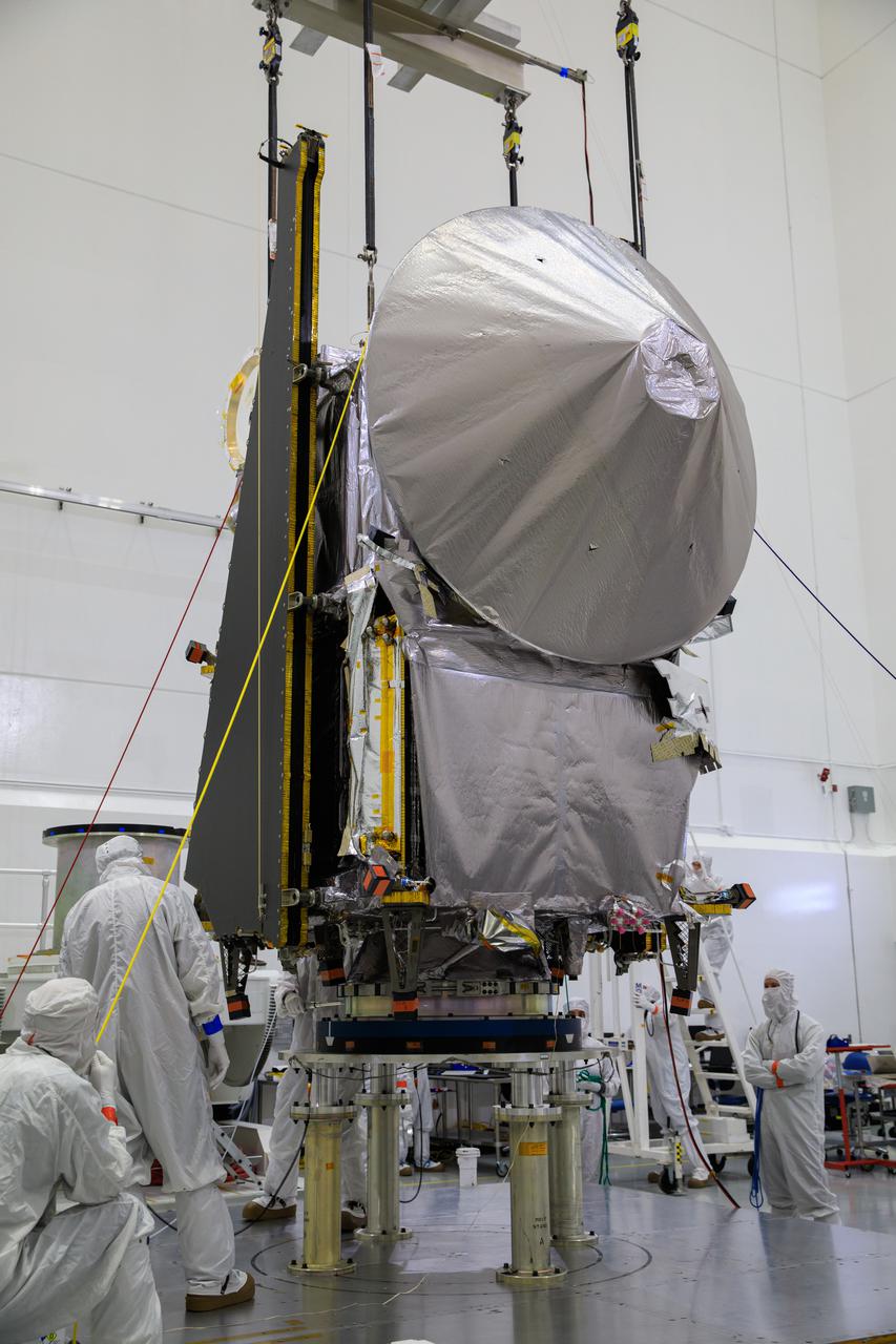 NASA’s Lucy spacecraft, with its high gain antenna attached, is secured on a stationary work stand inside the Astrotech Space Operations Facility in Titusville, Florida on Sept. 8, 2021. Lucy is scheduled to launch no earlier than Saturday, Oct. 16, on a United Launch Alliance Atlas V 401 rocket from Launch Pad 41 at Cape Canaveral Space Force Station. NASA’s Launch Services Program based at Kennedy Space Center is managing the launch. Over its 12-year primary mission, Lucy will explore a record-breaking number of asteroids, flying by one asteroid in the solar system’s main belt and seven Trojan asteroids. Additionally, Lucy’s path will circle back to Earth three times for gravity assists, making it the first spacecraft ever to return to the vicinity of Earth from the outer solar system. 