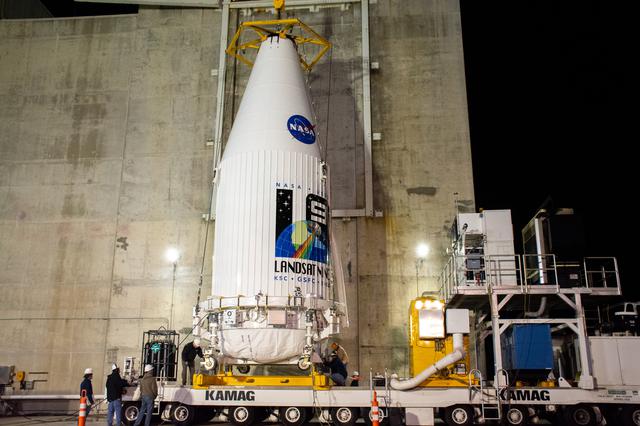 NASA image: Landsat 9 Hoist out of Transfer Tower at IPF