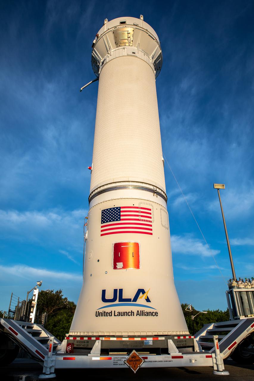 The United Launch Alliance (ULA) Centaur stage for NASA’s Lucy mission moves along the road to Space Launch Complex 41 at Cape Canaveral Space Force Station in Florida on Sept. 16, 2021. Lucy is scheduled to launch no earlier than Saturday, Oct. 16, on a ULA Atlas V 401 rocket from Pad 41. NASA’s Launch Services Program based at Kennedy Space Center is managing the launch. Over its 12-year primary mission, Lucy will explore a record-breaking number of asteroids, flying by one asteroid in the solar system’s main belt and seven Trojan asteroids. Additionally, Lucy’s path will circle back to Earth three times for gravity assists, making it the first spacecraft ever to return to the vicinity of Earth from the outer solar system. 