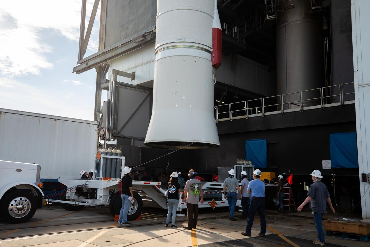A view of the United Launch Alliance (ULA) Centaur stage for NASA’s Lucy mission as it is lifted into the Vertical Integration Facility near Space Launch Complex 41 at Cape Canaveral Space Force Station in Florida on Sept. 16, 2021. Lucy is scheduled to launch no earlier than Saturday, Oct. 16, on a ULA Atlas V 401 rocket from Pad 41. NASA’s Launch Services Program based at Kennedy Space Center is managing the launch. Over its 12-year primary mission, Lucy will explore a record-breaking number of asteroids, flying by one asteroid in the solar system’s main belt and seven Trojan asteroids. Additionally, Lucy’s path will circle back to Earth three times for gravity assists, making it the first spacecraft ever to return to the vicinity of Earth from the outer solar system. 
