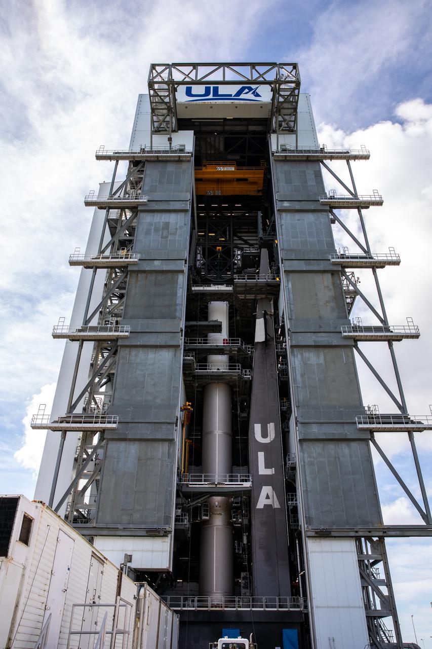 The United Launch Alliance Centaur stage is secured atop the Atlas V first stage for NASA’s Lucy mission inside the Vertical Integration Facility near Space Launch Complex 41 at Cape Canaveral Space Force Station in Florida on Sept. 16, 2021. Lucy is scheduled to launch no earlier than Saturday, Oct. 16, on a ULA Atlas V 401 rocket from Pad 41. NASA’s Launch Services Program based at Kennedy Space Center is managing the launch. Over its 12-year primary mission, Lucy will explore a record-breaking number of asteroids, flying by one asteroid in the solar system’s main belt and seven Trojan asteroids. Additionally, Lucy’s path will circle back to Earth three times for gravity assists, making it the first spacecraft ever to return to the vicinity of Earth from the outer solar system. 